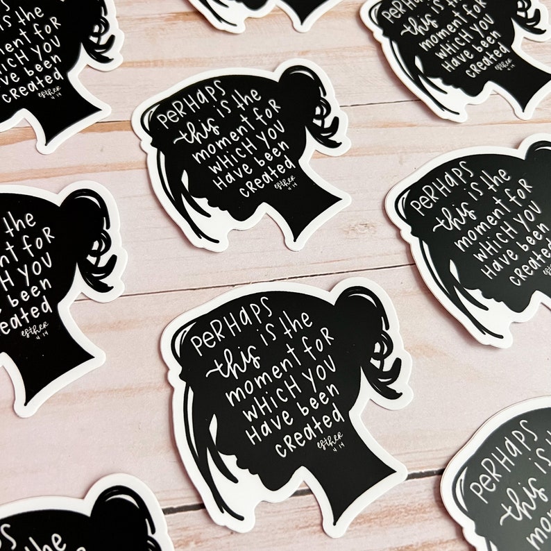 May include: Black and white silhouette sticker with the text "PERHAPS this is the moment for WHICH YOU Have been Created" repeated multiple times.