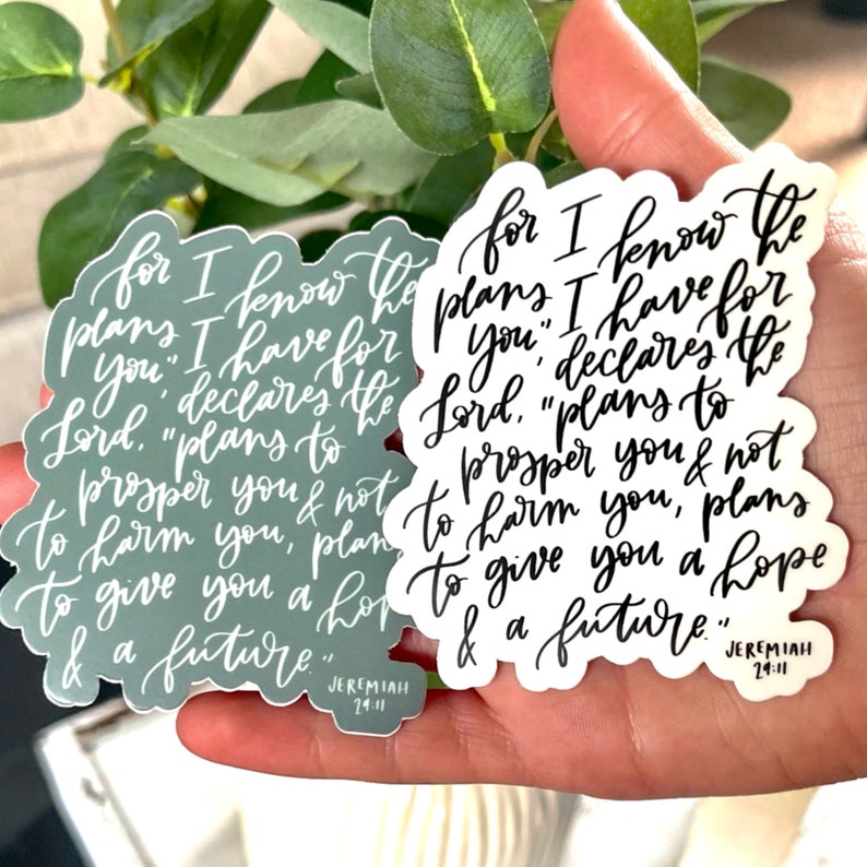 May include: Two stickers with a white background and black lettering. The stickers feature the Bible verse Jeremiah 29:11, which reads "For I know the plans I have for you" declares the Lord. "Plans to prosper you and not to harm you, plans to give you hope and a future."