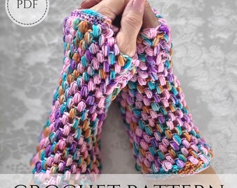 May include: A crochet pattern for colorful fingerless gloves. The gloves are made with a textured stitch and feature a mix of pink, purple, blue, and orange yarn.