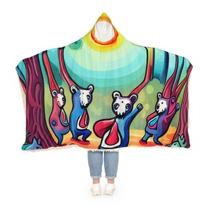 May include: A hooded fleece blanket with a colorful illustration of four bears dancing in a forest setting. The bears are blue, purple, pink, and green. The background is a bright yellow, green, and blue.