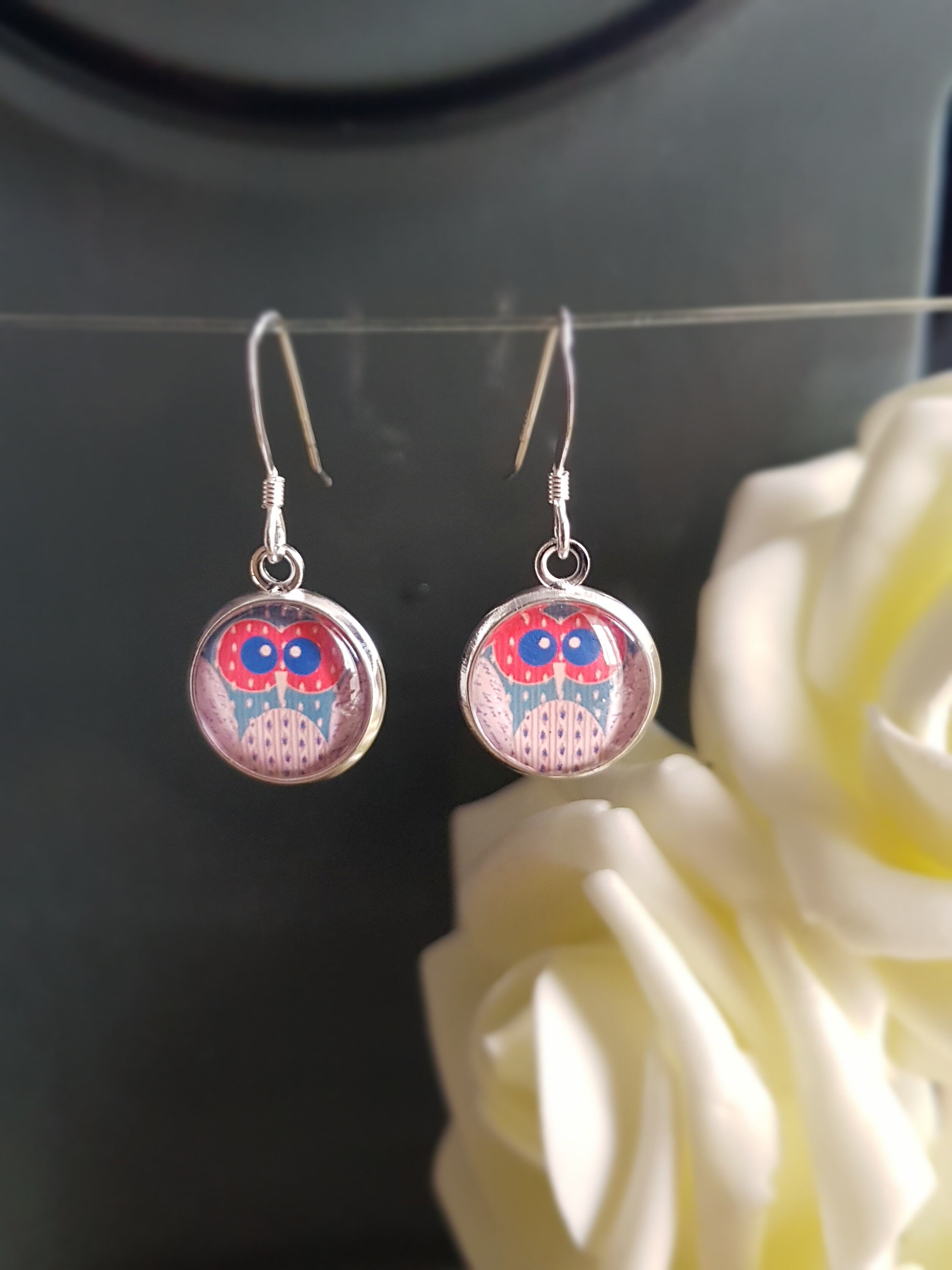 Glass dangle earrings deals