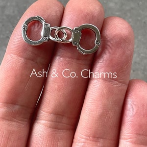Wedding, hen party handcuff charms, earrings, pendant or a keyring.