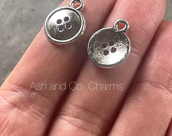 Silver button charms, made from silver alloy. Perfect for earrings, pendant or all your jewellery making needs. x 6
