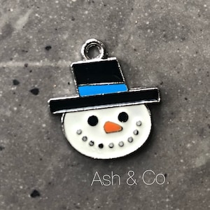 Snowman charm, unusual, enamelled, red, green, orange and white, christmas. Stainless steel UK