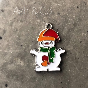 Snowman charm, unusual, enamelled, red, green, orange and white, christmas. Stainless steel UK