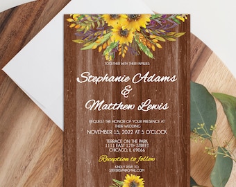 May include: Rustic woodgrain wedding invitation with sunflowers and greenery. The invitation reads "Together with their families, Stephanie Adams & Matthew Lewis, Request the honor of your presence at their wedding, November 15, 2022 at 5 o'clock, Terrace on the Park, 1111 East 12th Street, Chicago, IL 69066, Reception to follow, Kindly RSVP to: stefsrsvp@gmail.com"