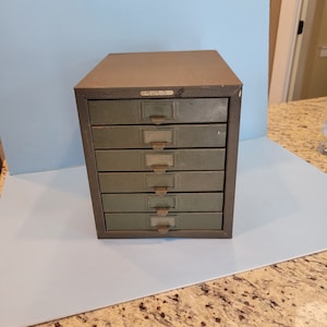 Vintage metal storage cabinet