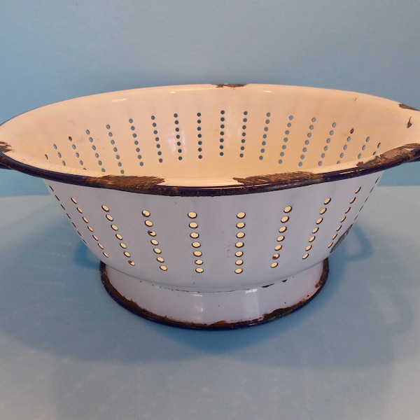 Vintage white enamelware colander