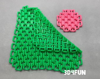 May include: Two green and one pink 3D printed chainmail coasters. The coasters are made of interlocking plastic rings. The text "3D4FUN" is printed on the bottom right corner of the image.