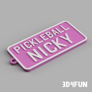 May include: Pink plastic keychain with white lettering that reads "Pickleball Nicky".