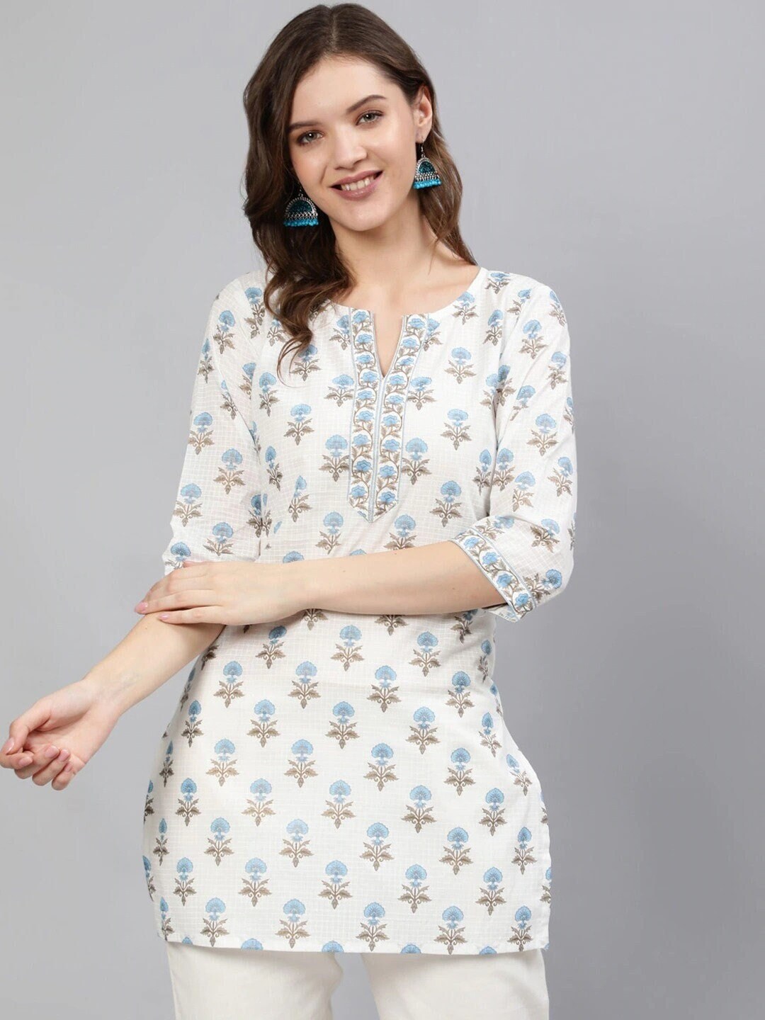 Buy FORGIVE Women's Cotton Blend Short Kurti | Ethnic Wear White Floral  Print Short Kurti | Sleeveless Pritned Calf Length Short Kurti at Amazon.in