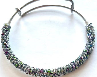 Greenish purple seed bead wire wrap bangle bracelet