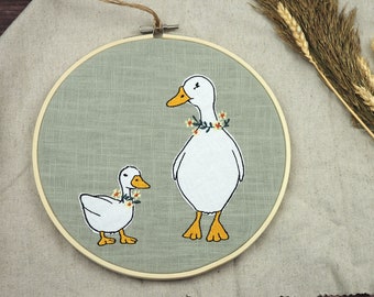 Embroidery frame picture spring ducks