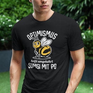 T-shirt ottimismo significa viceversa Sumsi con butt bee calabrone apicoltore uomo unisex