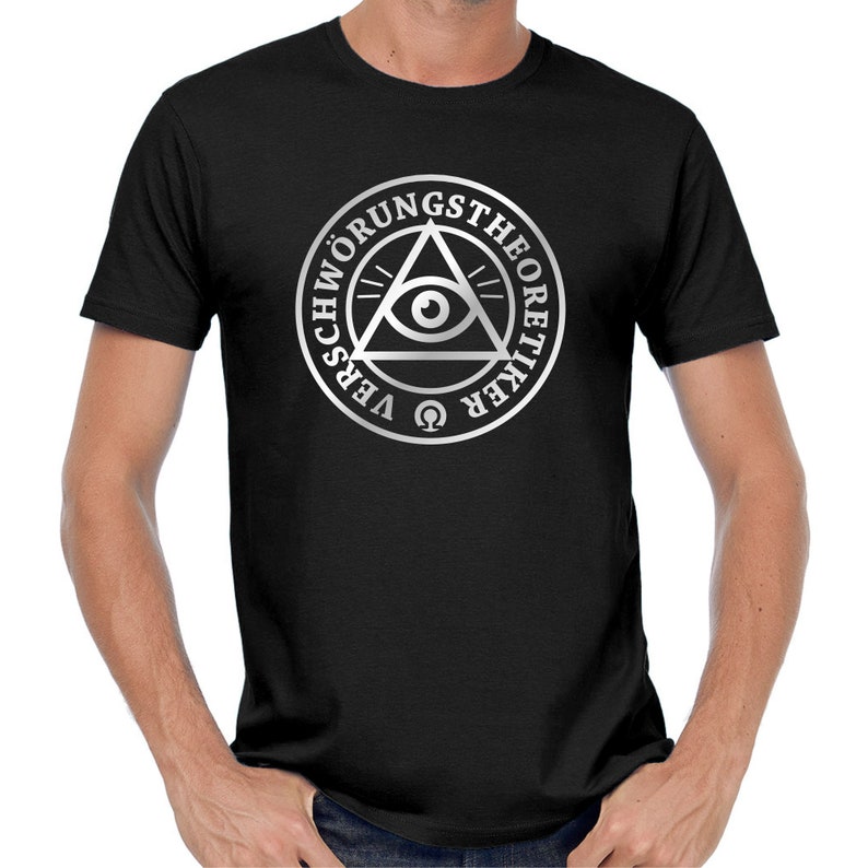 May include: Black t-shirt with a silver print of a triangle with an eye inside. The text around the triangle reads "Verschw&ouml;rungstheoretiker".