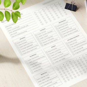 May include: A printable cleaning checklist with a black and white design. The checklist includes daily, weekly, and monthly cleaning tasks. The checklist is titled "Cleaning Habits".