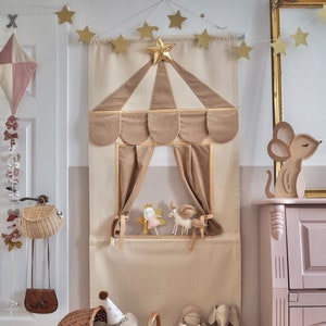 Taupe puppet doorway theatre by MIMIKI