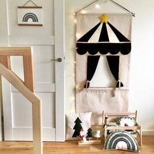 Black puppet doorway theatre by MIMIKI