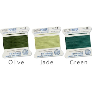 May include: Three spools of Griffin Nylon Power thread in olive, jade, and green. Each spool is labelled with "No. 10" and has a diameter of 0.90 mm. The text "For stringing pearls and beads" is printed on each label.