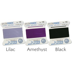 May include: Three spools of Griffin Nylon Power thread in Lilac, Amethyst, and Black. Each spool is labelled with "No. 10" and "&Oslash; 0,90 mm". The text "For stringing pearls and beads" is also visible.