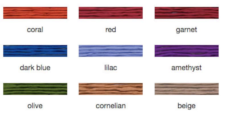 May include: Nine color swatches of thread in coral, red, garnet, dark blue, lilac, amethyst, olive, cornelian, and beige. Each swatch is labeled with its corresponding color name in a sans-serif font.