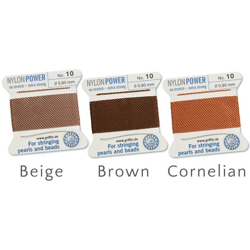 May include: Three spools of nylon thread in beige, brown, and cornelian. Each spool has a white label with the text "NYLON POWER" and "No. 10". The labels also state "For stringing pearls and beads". The thread diameter is 0.90 mm.