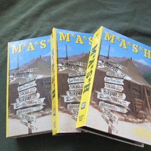 Vintage VHS Collector's Edition of MASH in Good Condition. Most DVD's Have Been Watched and Some Are Still Sealed. 25 Videos in All