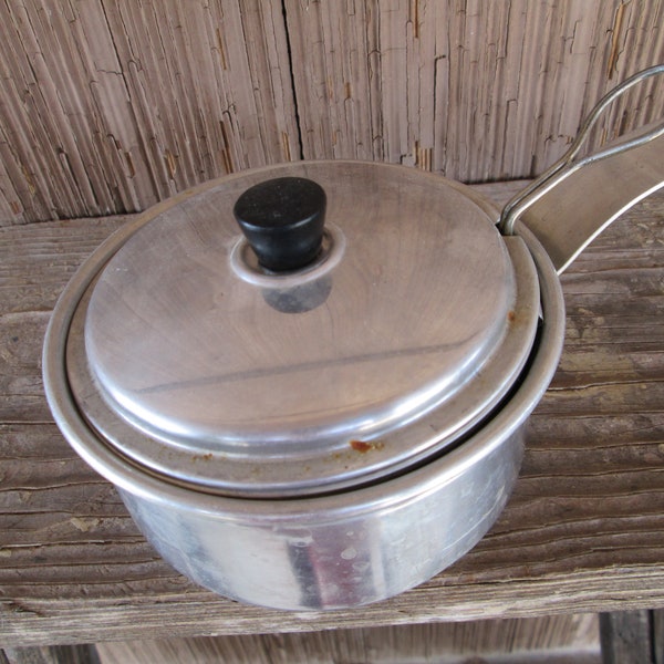 Vintage 3 piece Aluminum Poached Egg Pot in Like New Condition. A fun Cooking Gadget For People Who Like Old Cooking Pots and Pans.