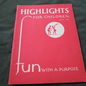 May include: A vintage copy of "Highlights for Children" magazine from April 1952. The cover is a vibrant red with white text and illustrations, including the words "Highlights for Children" and "fun with a purpose."