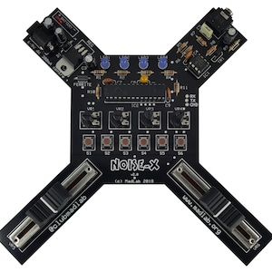 May include: A black circuit board with the text "NOISE-X v2.0 (c) MadLab 2018" printed on it. The board has several switches, potentiometers, and LEDs. The board is designed for creating electronic music.