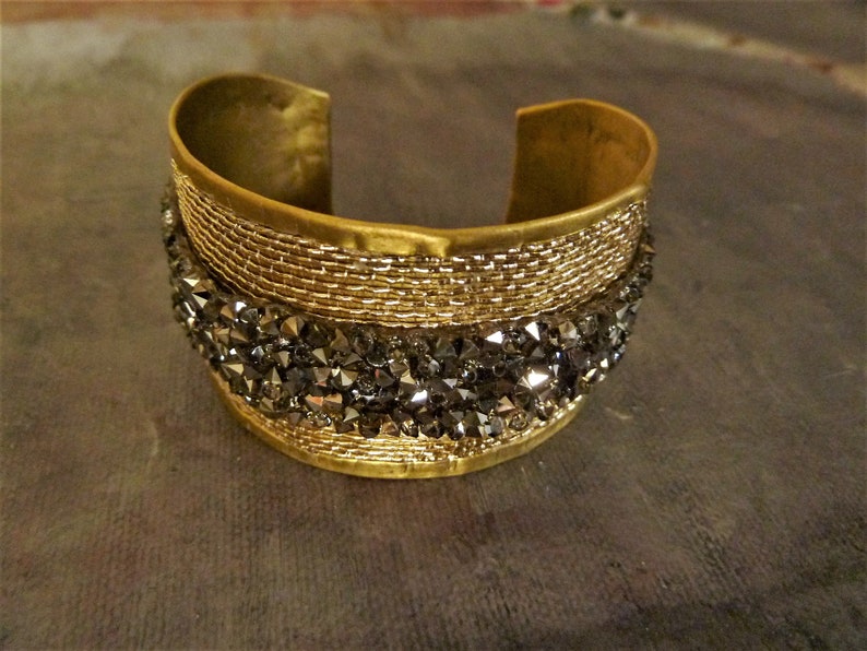 Wide unusual cuff bracelet with crystals