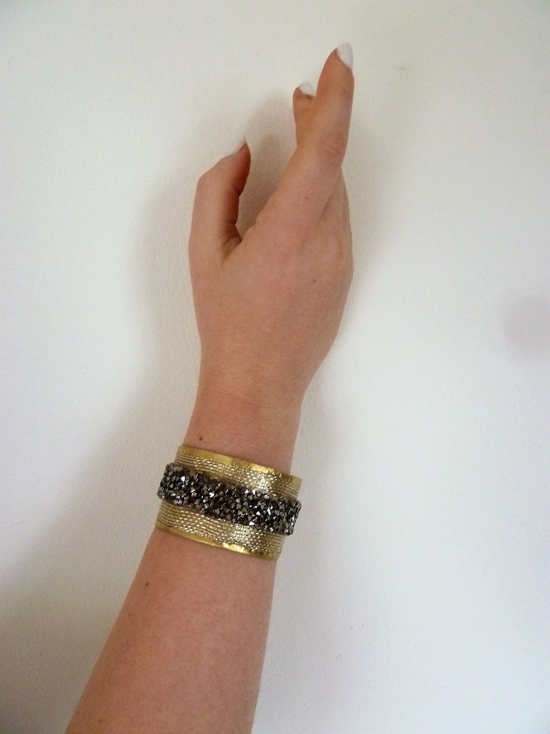 Wide unusual cuff bracelet with crystals