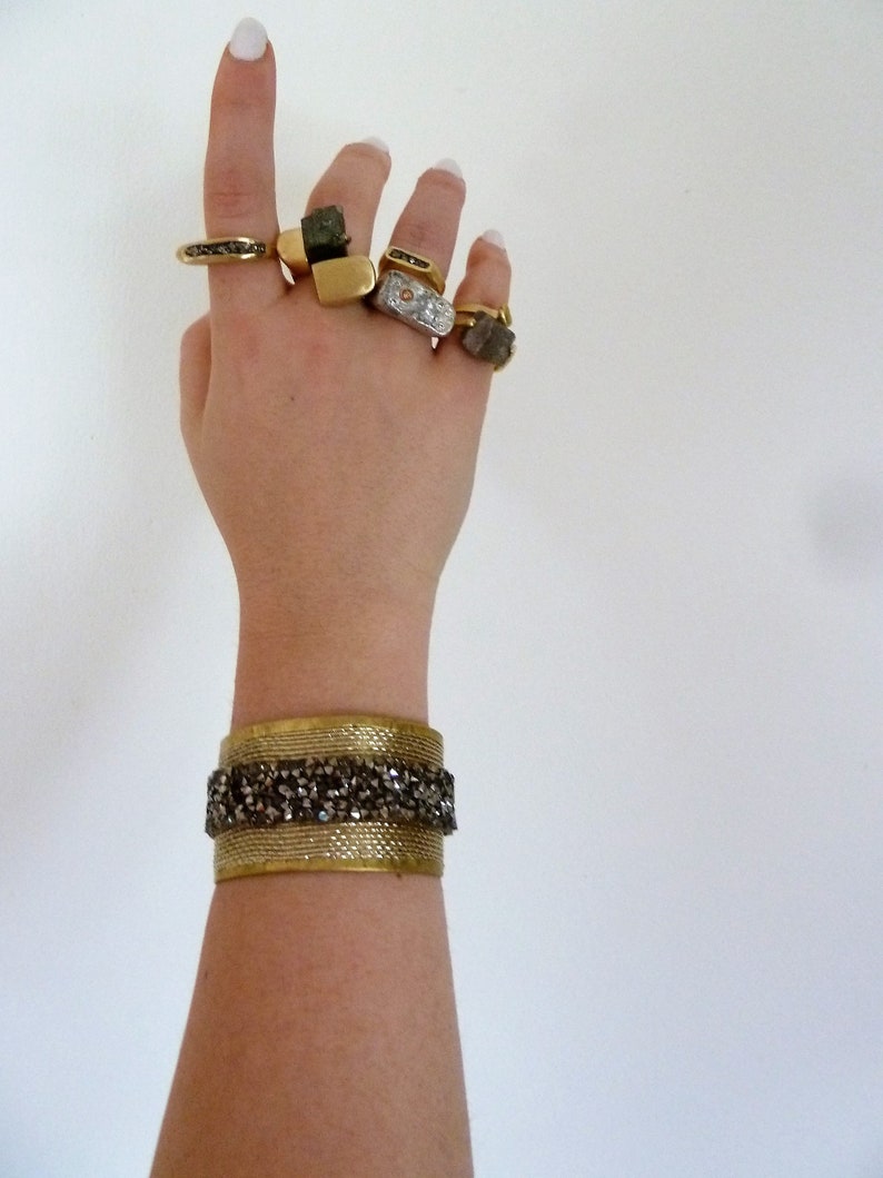Wide unusual cuff bracelet with crystals