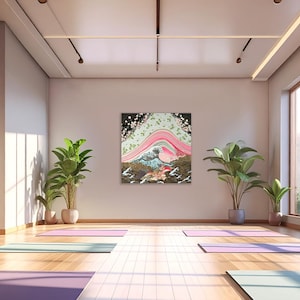 Japanese inspired wave and blossom landscape paper collage art print featuring layered pink curves and textured patterns, displayed in a bright minimalist yoga studio with wooden floors and indoor plants.