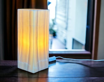 Elegant Onyx Glow: Handcrafted Lamp for Warm Ambiance