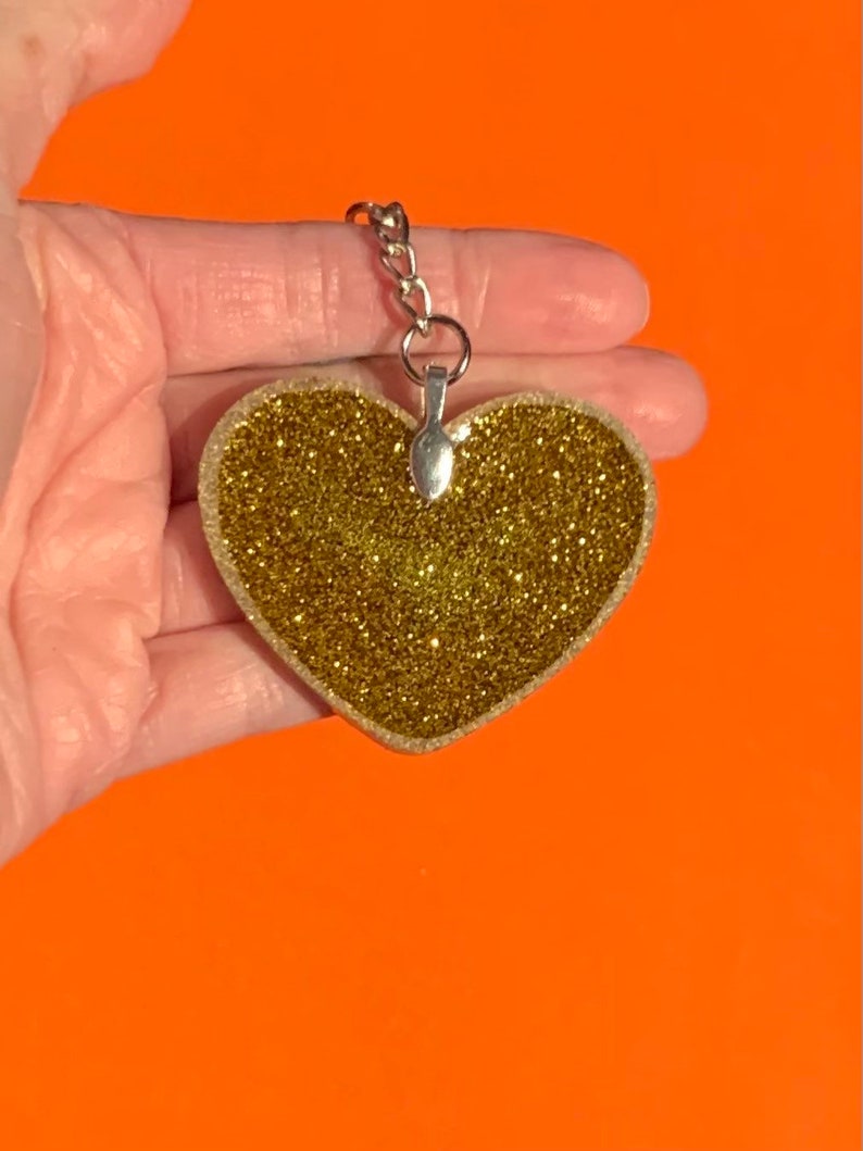 Gold Go Away keychain