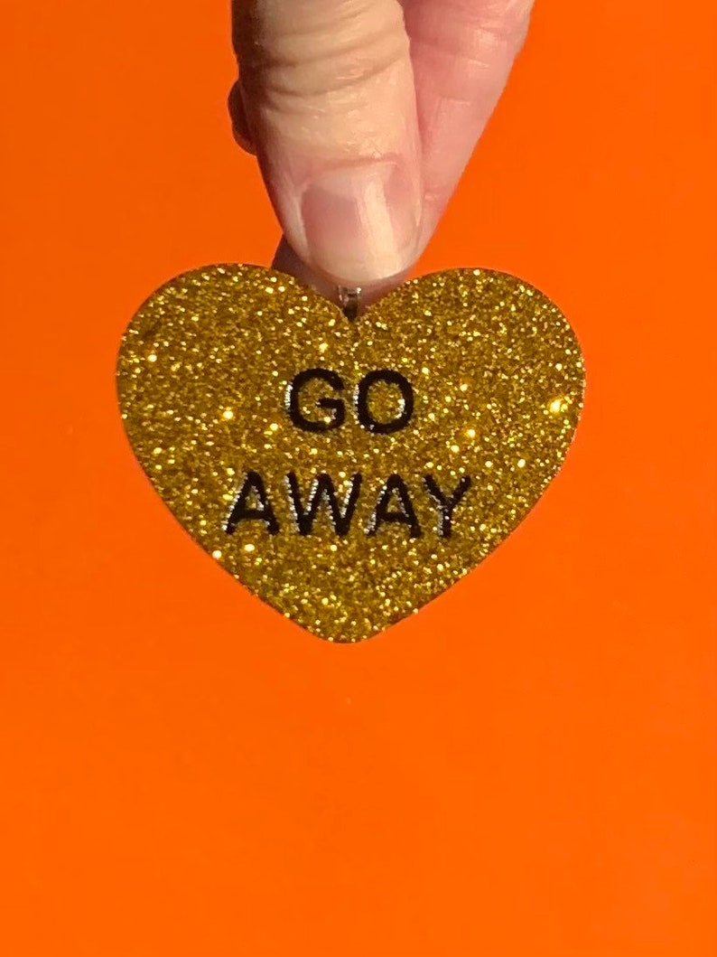Gold Go Away keychain