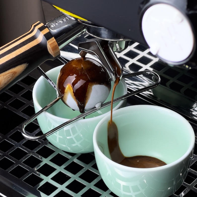 Size comparison: blanching tool next to espresso cup and shot glass