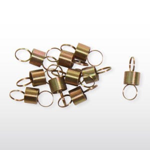 May include: A group of 13 gold-colored metal spring clips. The clips are arranged in a loose pile on a white surface.