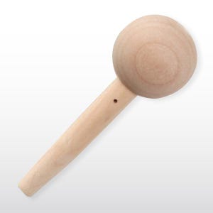 May include: A light-colored wooden mallet with a rounded head and a long, tapered handle. The head is a perfect sphere, and the handle has a small hole near the head. The wood has a smooth, unfinished appearance.