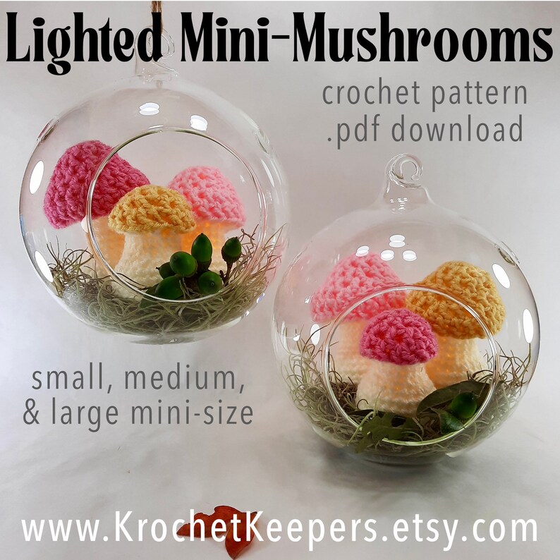 May include: Two glass terrariums each contain crochet mushrooms in pink, yellow, and white. The terrariums are filled with moss and greenery. Text reads "Lighted Mini-Mushrooms" and "crochet pattern .pdf download". The website address is www.KrochetKeepers.etsy.com.