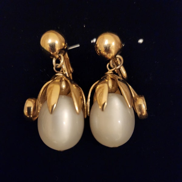 Rare Napier Haute Couture  Gold Tone White Moonglow Dangling Clip On Earrings designed by Eugene Bertolli