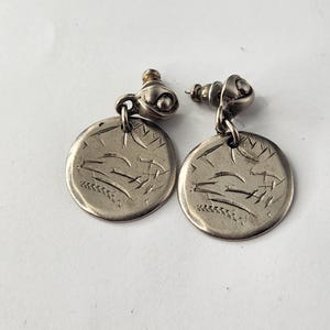 Vintage Donna Karan silver tone dangling earrings