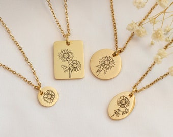 May include: Three gold necklaces with different pendant styles featuring a delicate sunflower design. The pendants are a rectangle, a circle, and an oval.