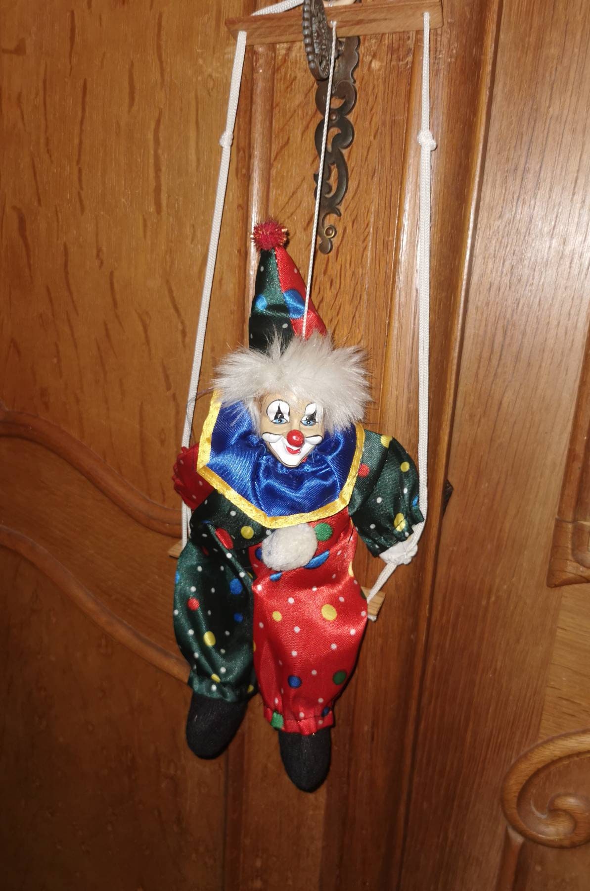 Skeleton Clown on the swing, Hanging figure for horror gardens