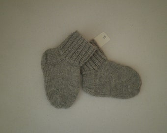 Taille des chaussettes bébé 18