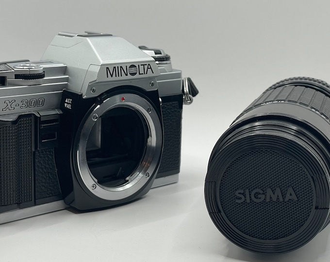 Minolta X-300 SLR 35mm Film Camera set with Sigma Zoom 75-210MM Lens - Fully Tested - Free Worldwide Shipping