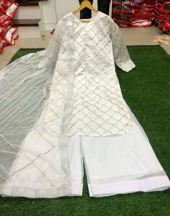 white plazo with kurti