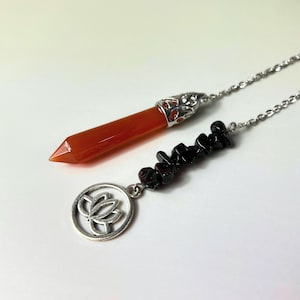 Carnelian and obsidian crystal pendulum with a lotus divination dowsing pendulum altar tool