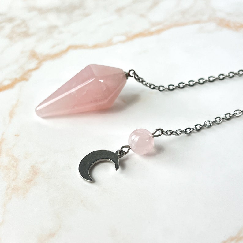 Rose quartz gemstone dowsing pendulum crescent moon and stainless steel witch divination tool